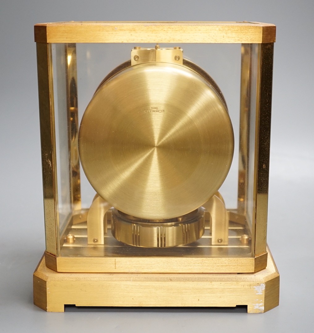 A Jaegar leCoultre Atmos clock with wall bracket